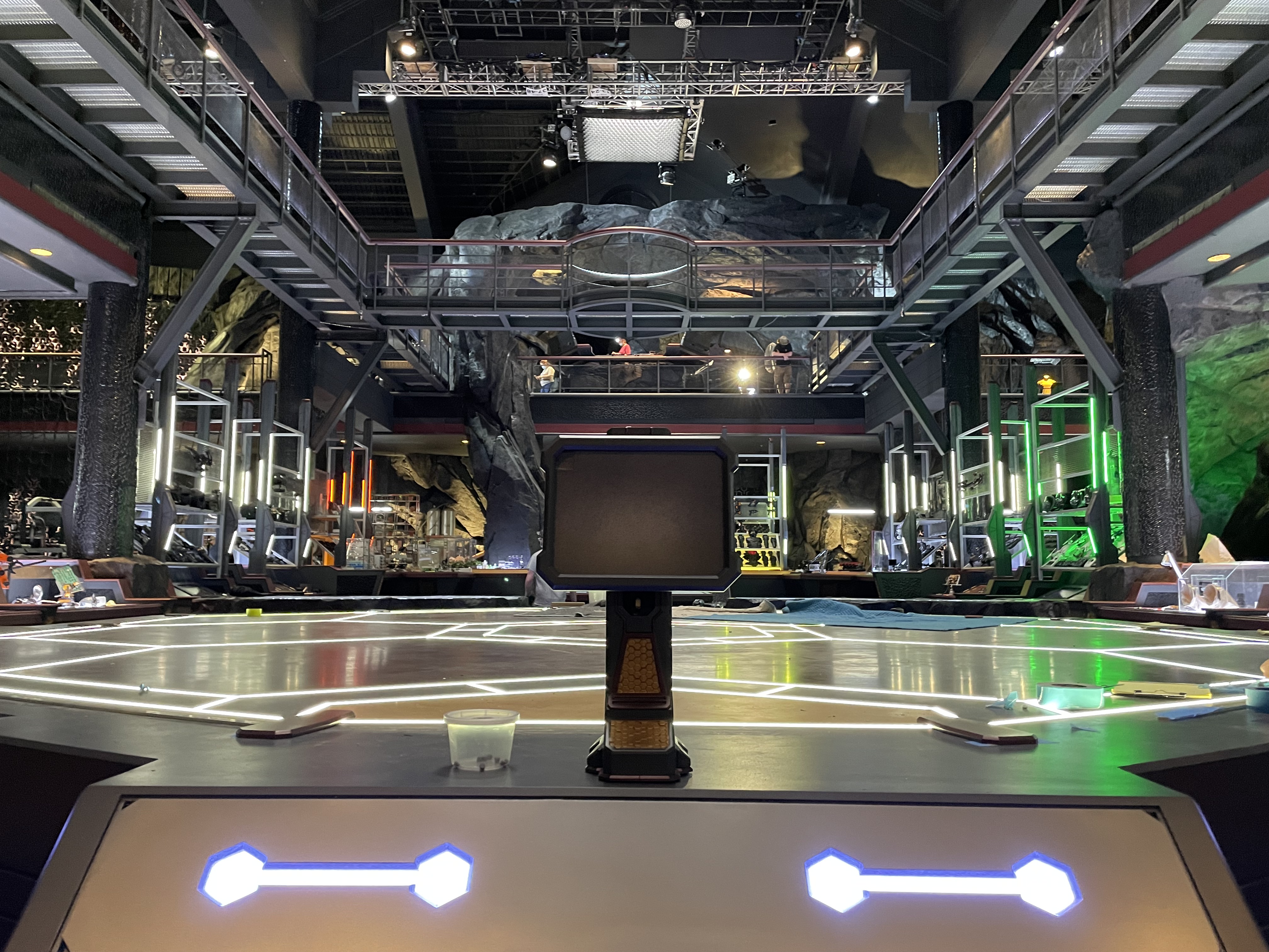 The set in action during filming, showcasing the practical lighting and atmosphere